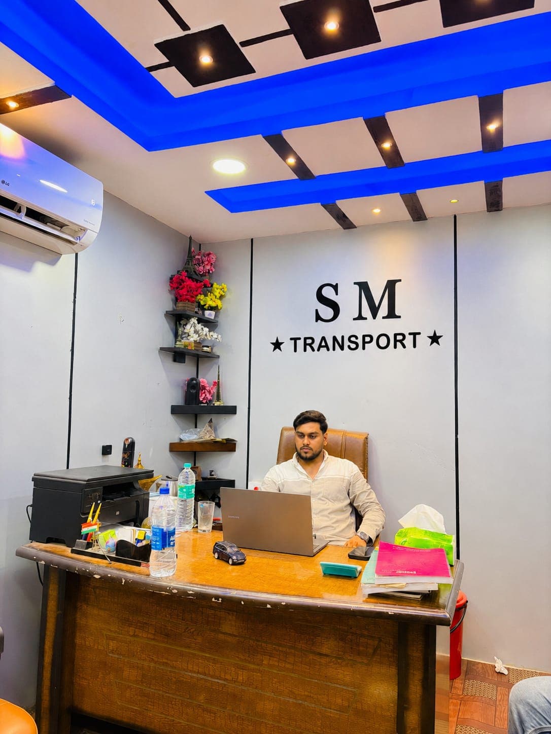 The SM Transport office workspace and team